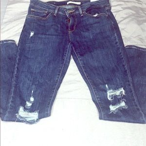 Distressed Levi blue jeans